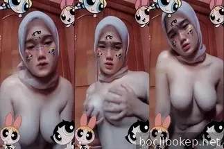 Bokep Indo ABG Hijab Remas Susunya Sambil Desah